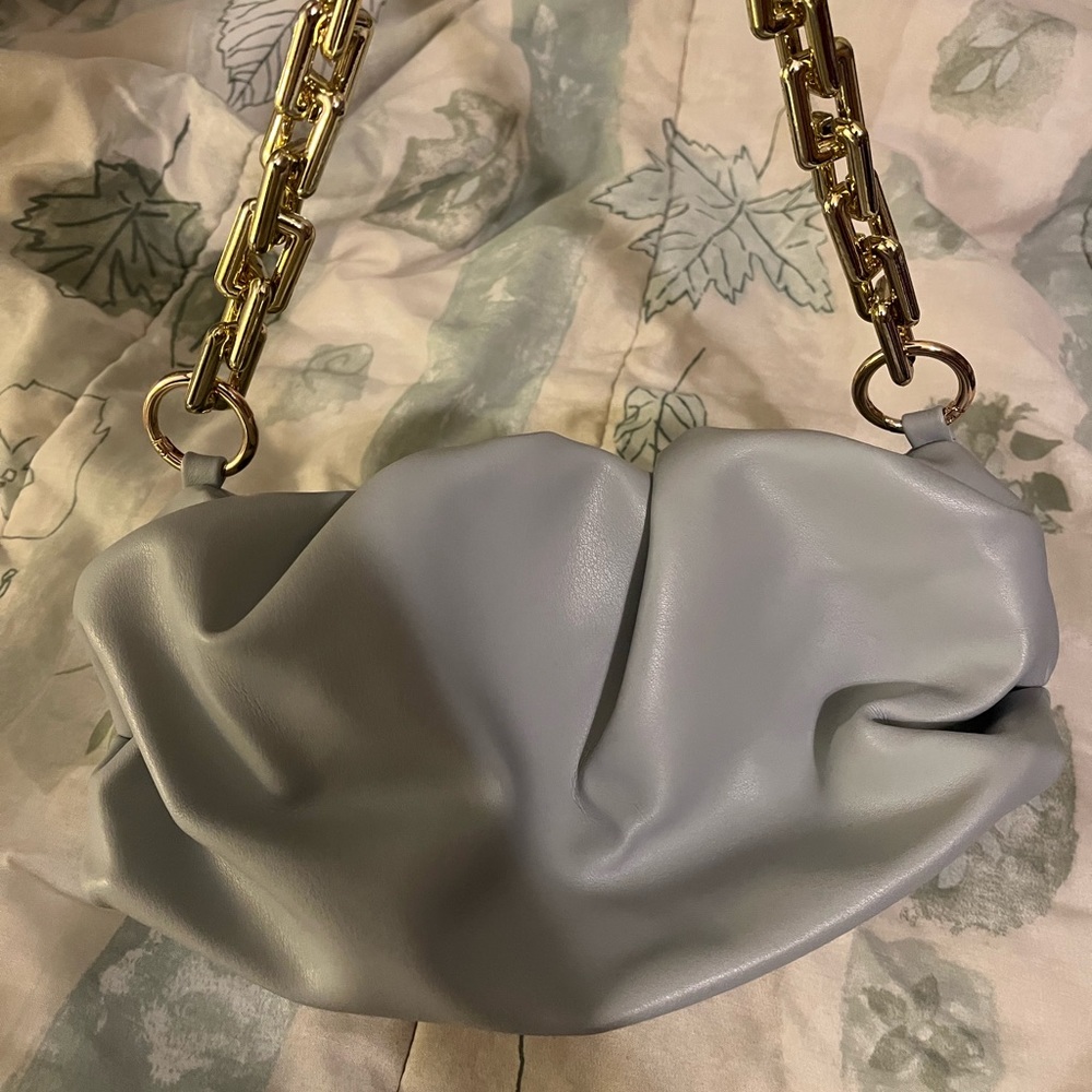 light blue purse with chain